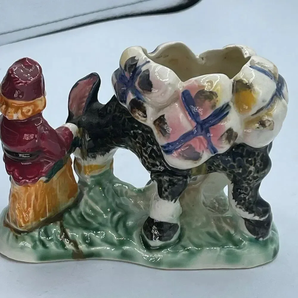 Vintage Japan planter man and donkey ceramic taking a break.
